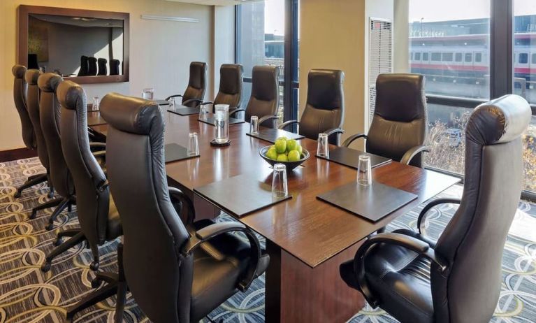 Bright-lit meeting room at Hilton Chicago O'Hare Airport.