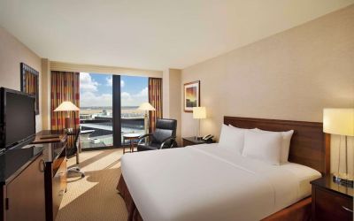 Day use room with sound proofed windows and lounger at Hilton Chicago O'Hare Airport.