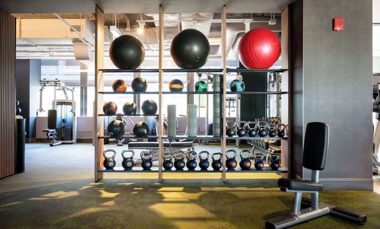 Fully equipped fitness center at Hilton Chicago O'Hare Airport.