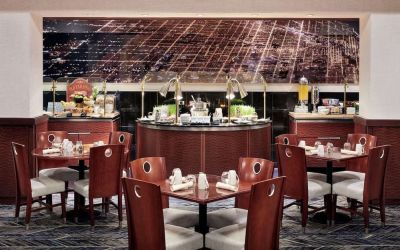 Dining area perfect for coworking at Hilton Chicago O'Hare Airport.