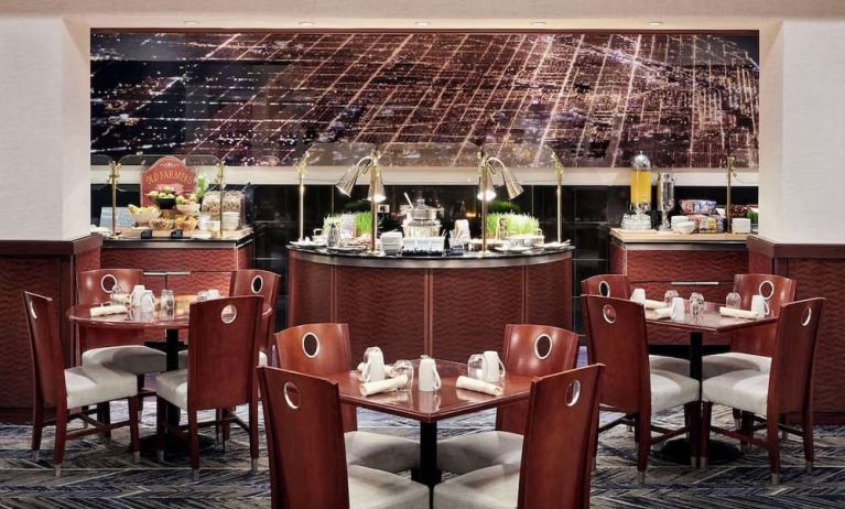 Dining area perfect for coworking at Hilton Chicago O'Hare Airport.