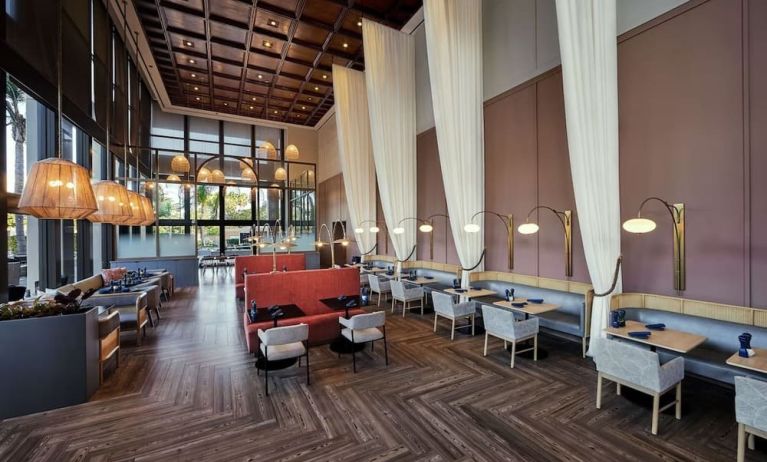 Breakfast area with natural light perfect for coworking at Hotel Fera Anaheim, A DoubleTree By Hilton.