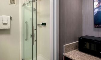 Private guest bathroom with shower at Sonesta Select Boston Milford.