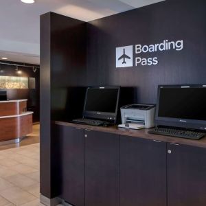 Business center with computers and printer at Sonesta Select Boston Milford.