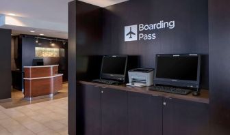 Business center with computers and printer at Sonesta Select Boston Milford.