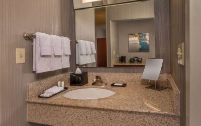 Private guest bathroom with free toiletries at Sonesta Select Arlington Rosslyn.