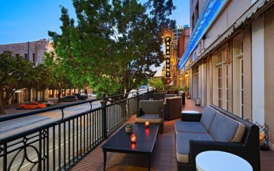 Hotel terrace with lounge seating at The Stephen F Austin Royal Sonesta Hotel
