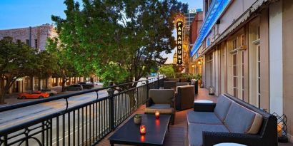 Hotel terrace with lounge seating at The Stephen F Austin Royal Sonesta Hotel