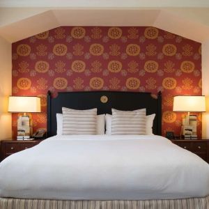 King bed at The Stephen F Austin Royal Sonesta Hotel.
