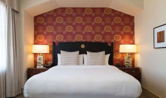 King bed at The Stephen F Austin Royal Sonesta Hotel.