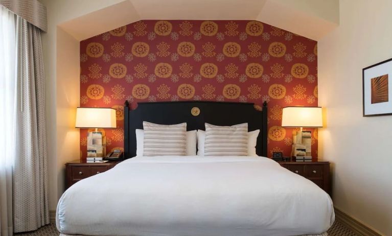 King bed at The Stephen F Austin Royal Sonesta Hotel.