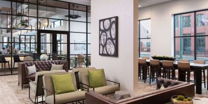 Lobby and coworking lounge at Hilton Garden Inn Memphis Downtown.