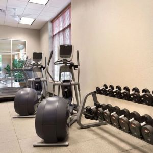 Fitness center at Embassy Suites By Hilton Nashville South Cool Springs.
