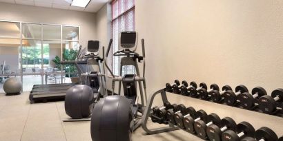 Fitness center at Embassy Suites By Hilton Nashville South Cool Springs.
