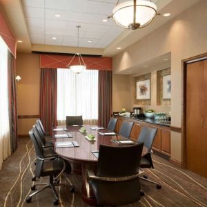 Bright-lit meeting room at Embassy Suites By Hilton Nashville South Cool Springs.