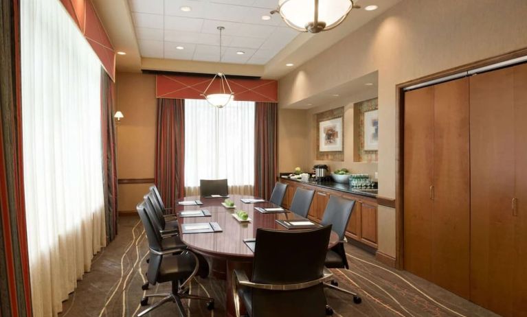 Bright-lit meeting room at Embassy Suites By Hilton Nashville South Cool Springs.