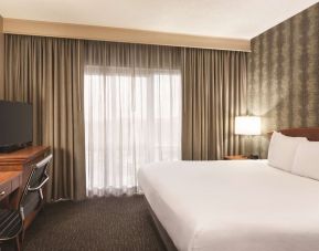 Day use room with work desk and natural light at Embassy Suites By Hilton Nashville South Cool Springs.