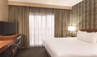 Day use room with work desk and natural light at Embassy Suites By Hilton Nashville South Cool Springs.