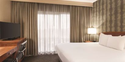 Day use room with work desk and natural light at Embassy Suites By Hilton Nashville South Cool Springs.