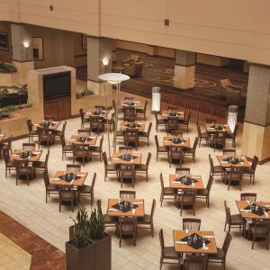 Dining area perfect for coworking at Embassy Suites By Hilton Nashville South Cool Springs.