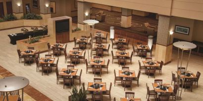 Dining area perfect for coworking at Embassy Suites By Hilton Nashville South Cool Springs.