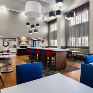 Lobby and coworking lounge at Hampton Inn & Suites Schererville.