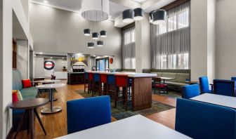 Lobby and coworking lounge at Hampton Inn & Suites Schererville.
