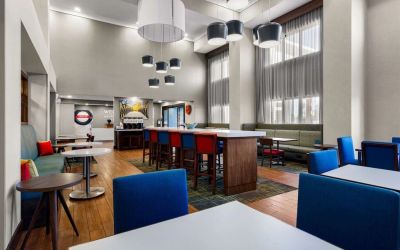 Lobby and coworking lounge at Hampton Inn & Suites Schererville.