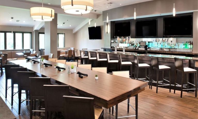 Bright-lit hotel bar at Embassy Suites By Hilton Seattle-North-Lynnwood.
