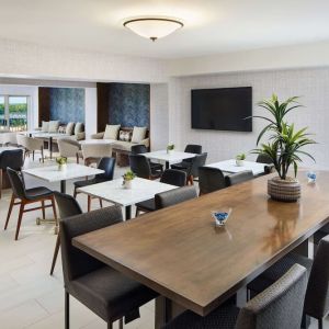 Executive lounge perfect for coworking at Hilton Charlotte Airport.
