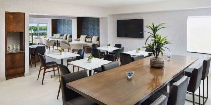 Executive lounge perfect for coworking at Hilton Charlotte Airport.
