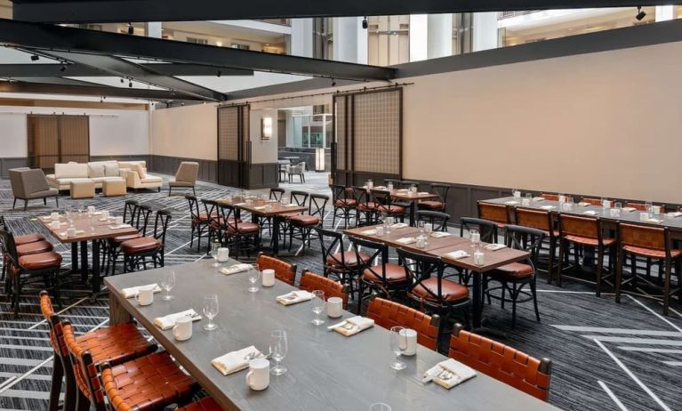 Dining area perfect for coworking at Hilton Charlotte Airport.
