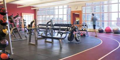 Fully-equipped fitness center at Hilton Chicago.