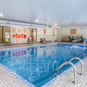 Refreshing indoor pool at The Leo Collection, An Ascend Collection Hotel.