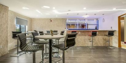 Coworking lounge at The Leo Collection, An Ascend Collection Hotel.