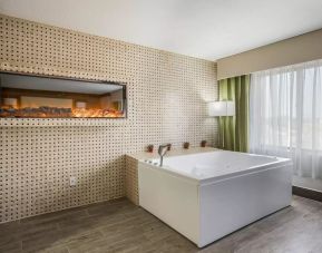 Bath tub inside day use room at The Leo Collection, An Ascend Collection Hotel.