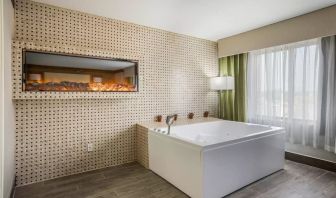 Bath tub inside day use room at The Leo Collection, An Ascend Collection Hotel.
