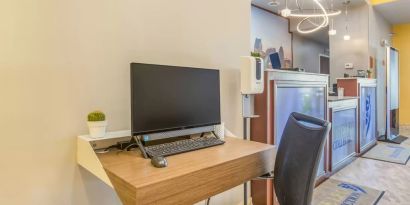 Business center at The Leo Collection, An Ascend Collection Hotel.