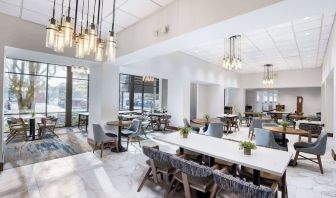 Dining area perfect for coworking at Doubletree By Hilton Houston Medical Center Hotel & Suites.