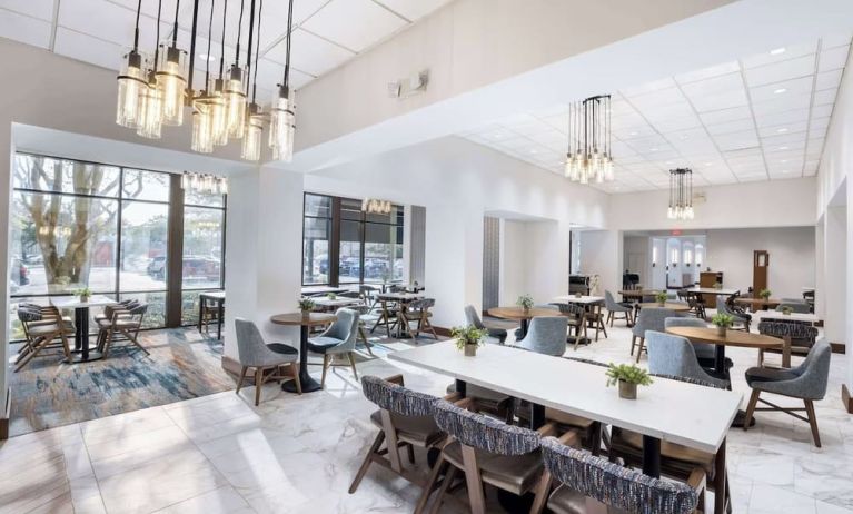 Dining area perfect for coworking at Doubletree By Hilton Houston Medical Center Hotel & Suites.