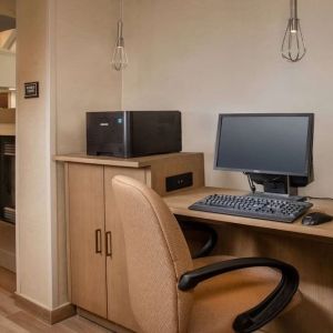 Business center with computer, printer and ergonomic chair at Sonesta ES Suites Baltimore BWI Airport.