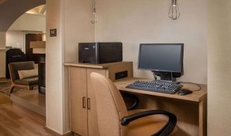 Business center with computer, printer and ergonomic chair at Sonesta ES Suites Baltimore BWI Airport.