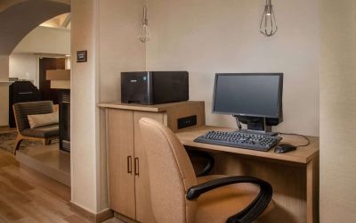 Business center with computer, printer and ergonomic chair at Sonesta ES Suites Baltimore BWI Airport.