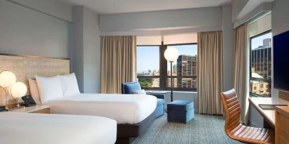 Day use twin room with work desk at New York Hilton Midtown.