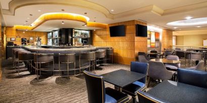 Hotel bar and lounge area at New York Hilton Midtown.