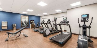 Fully equipped fitness center at Hampton Inn & Suites Benton Harbor.