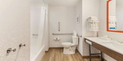 Private guest bathroom at Hampton Inn & Suites Benton Harbor.