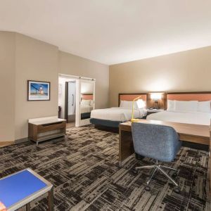 Day use twin room with workspace and private guest bathroom at Hampton Inn & Suites Benton Harbor.
