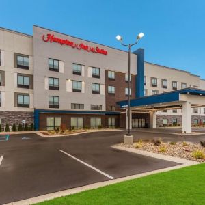 Hotel exterior and parking area at Hampton Inn & Suites Benton Harbor.
