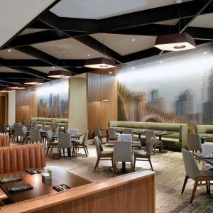 Dining area with comfortable seating at Hilton Minneapolis.